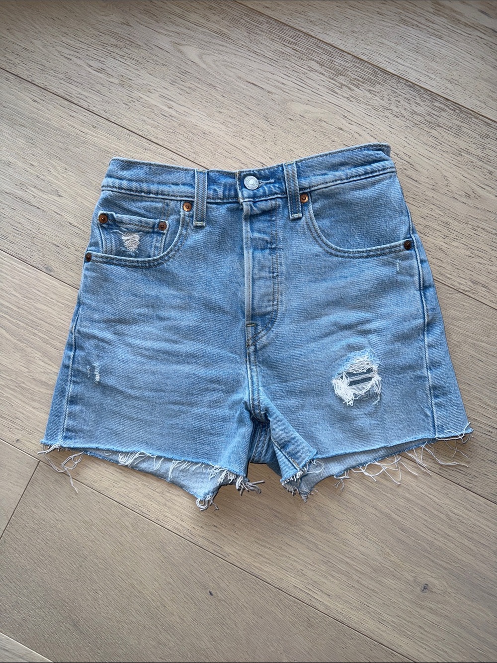 Levi’s Ribcage Distressed Light Blue Denim Shorts